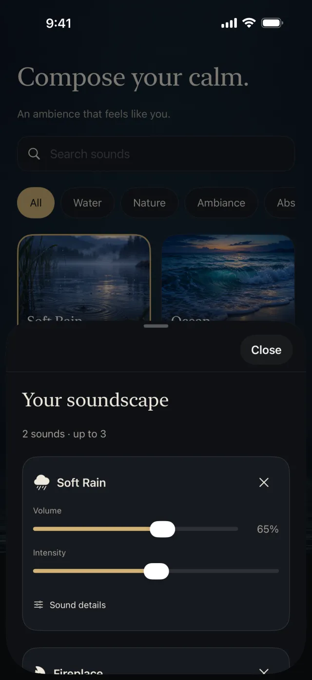 Yū Focus Ambiences screen: the “Your soundscape” sheet open with two sounds, Soft Rain at 65% volume with an intensity slider, and Fireplace below; up to three sounds.